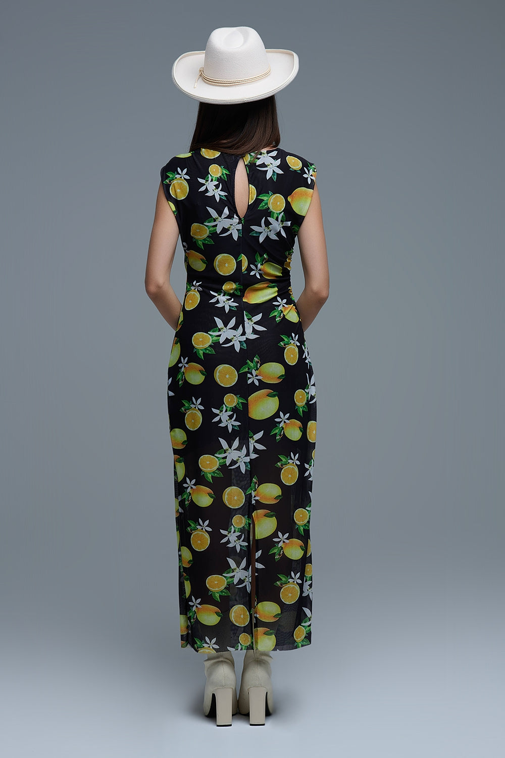 Maxi abito in tulle nero con stampa laterale in giallo e limone