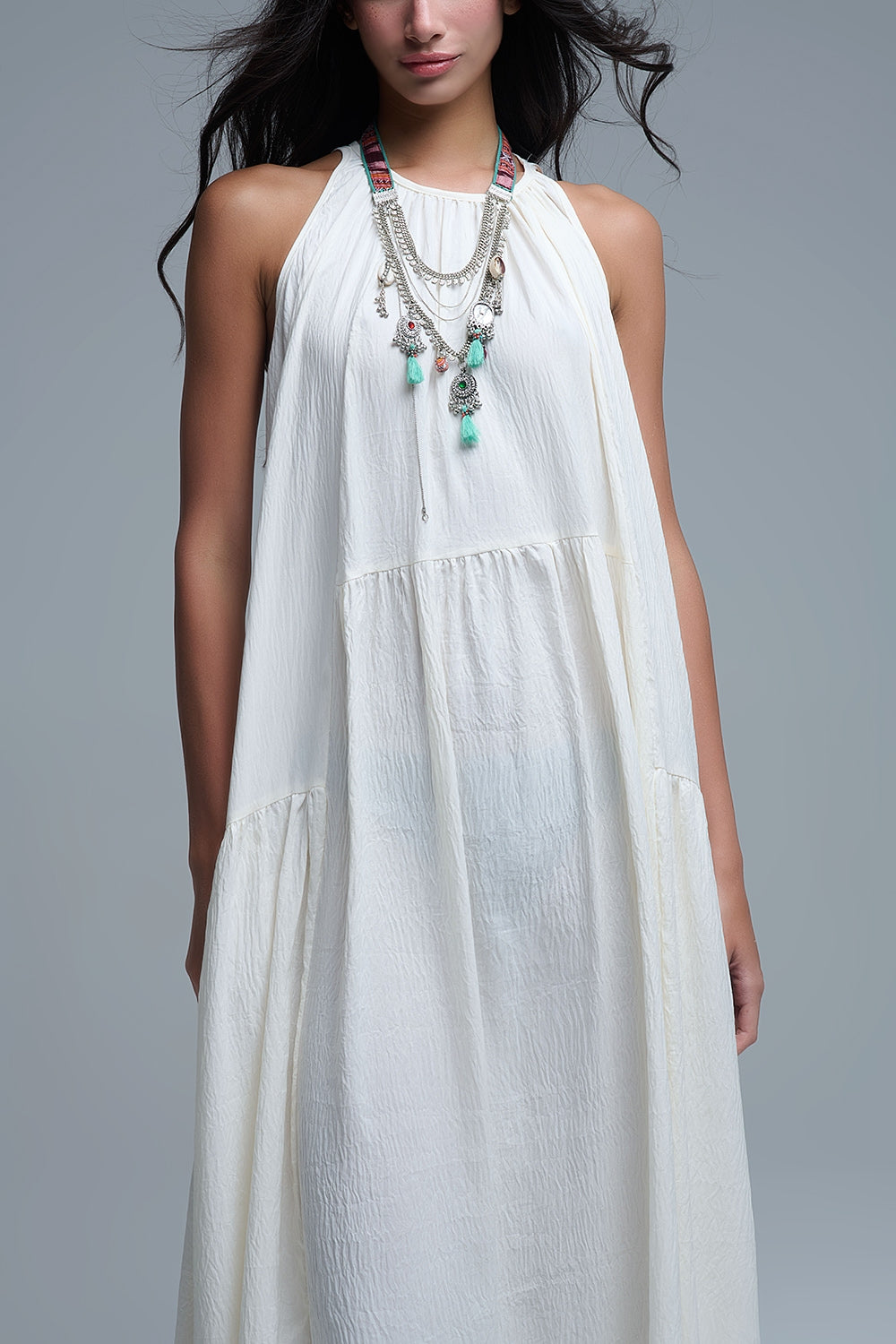 Maxi abito panna con scollo ad aletta e dettagli in cucitura