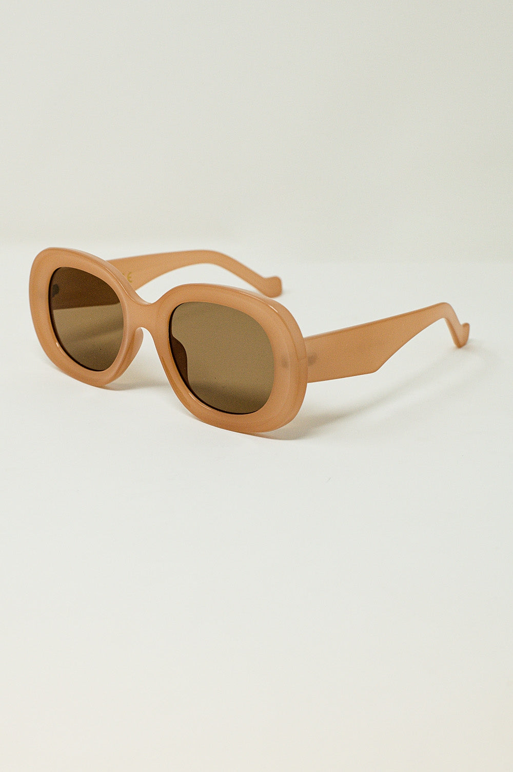 Occhiali da sole circolari oversize color beige
