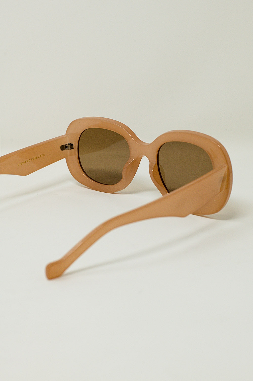 Occhiali da sole circolari oversize color beige