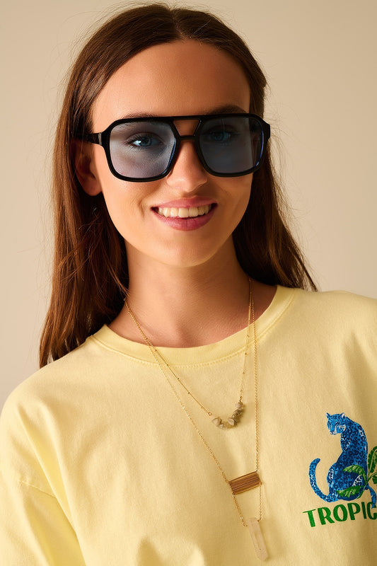 Q2 Occhiali da sole con montatura nera e lenti blu
