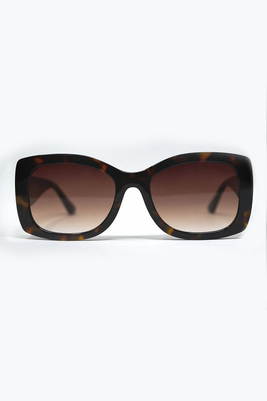 Q2 Occhiali da sole ovali oversize marroni in acetato