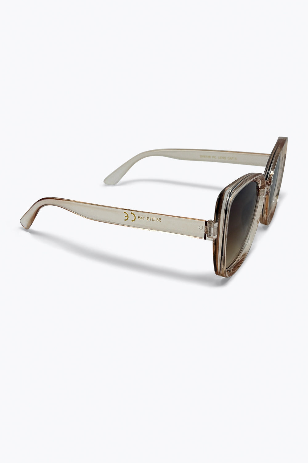 Occhiali da sole quadrati oversize con lenti sfumate in acetato trasparente beige