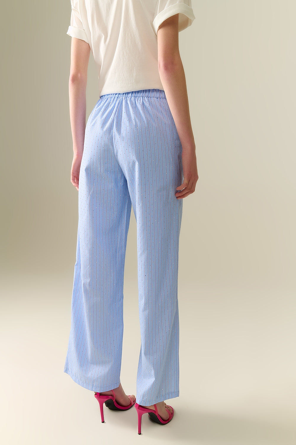 Pantaloni a gamba larga a righe blu con abbellimento in strass