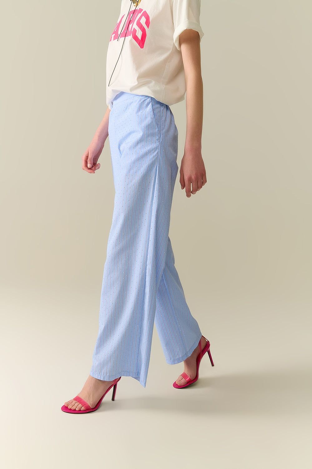 Pantaloni a gamba larga a righe blu con abbellimento in strass