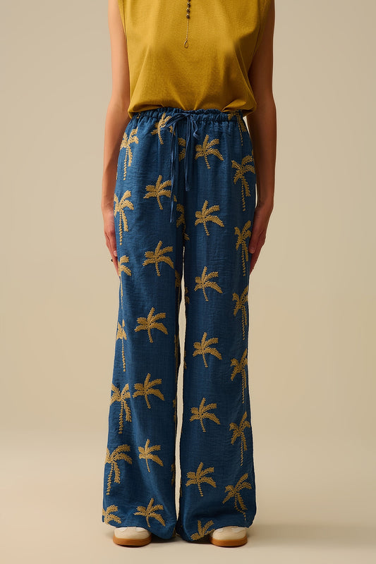 Q2 Pantaloni a gamba larga blu con ricamo di palme beige
