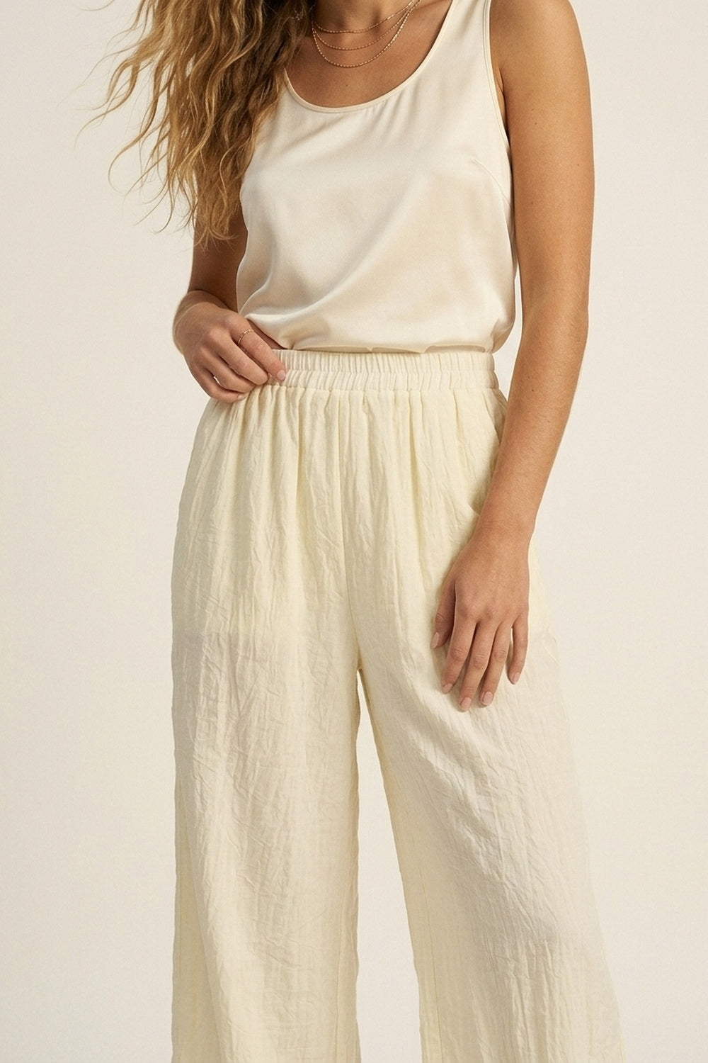 Pantaloni a Gamba Larga Color Crema con Tessuto Trasparente