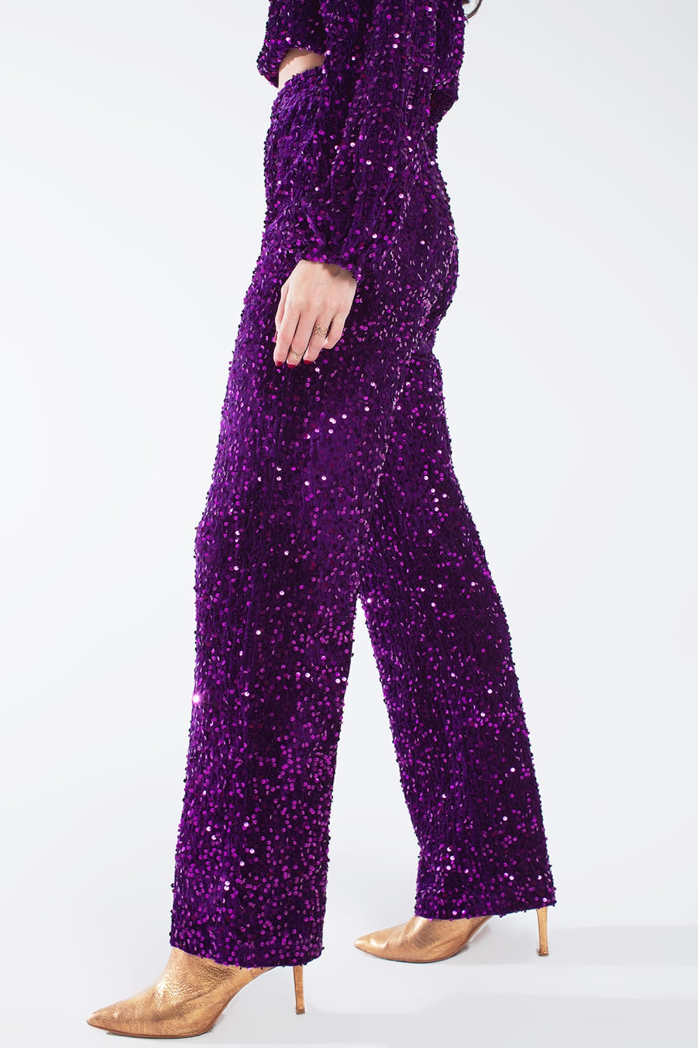 Pantaloni a gamba larga in paillettes con tasche laterali in viola