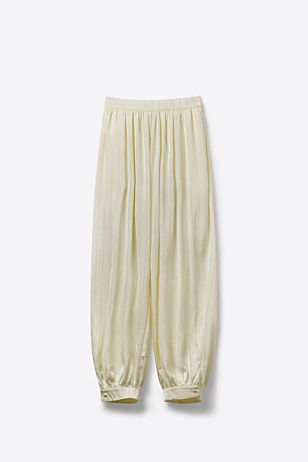 Pantaloni a palloncino a vita alta color crema con polsini abbottonati
