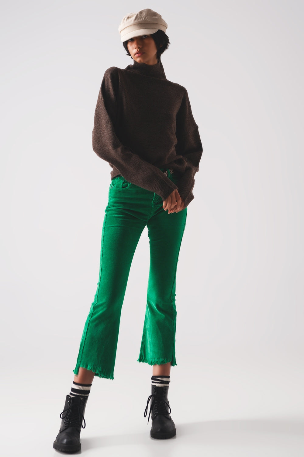 Pantaloni a zampa in velluto a coste color verde intenso