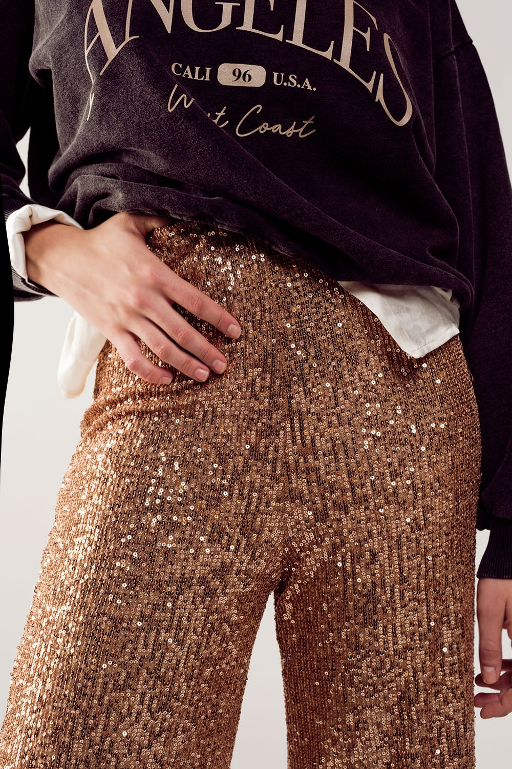 Pantaloni ampi in paillettes oro