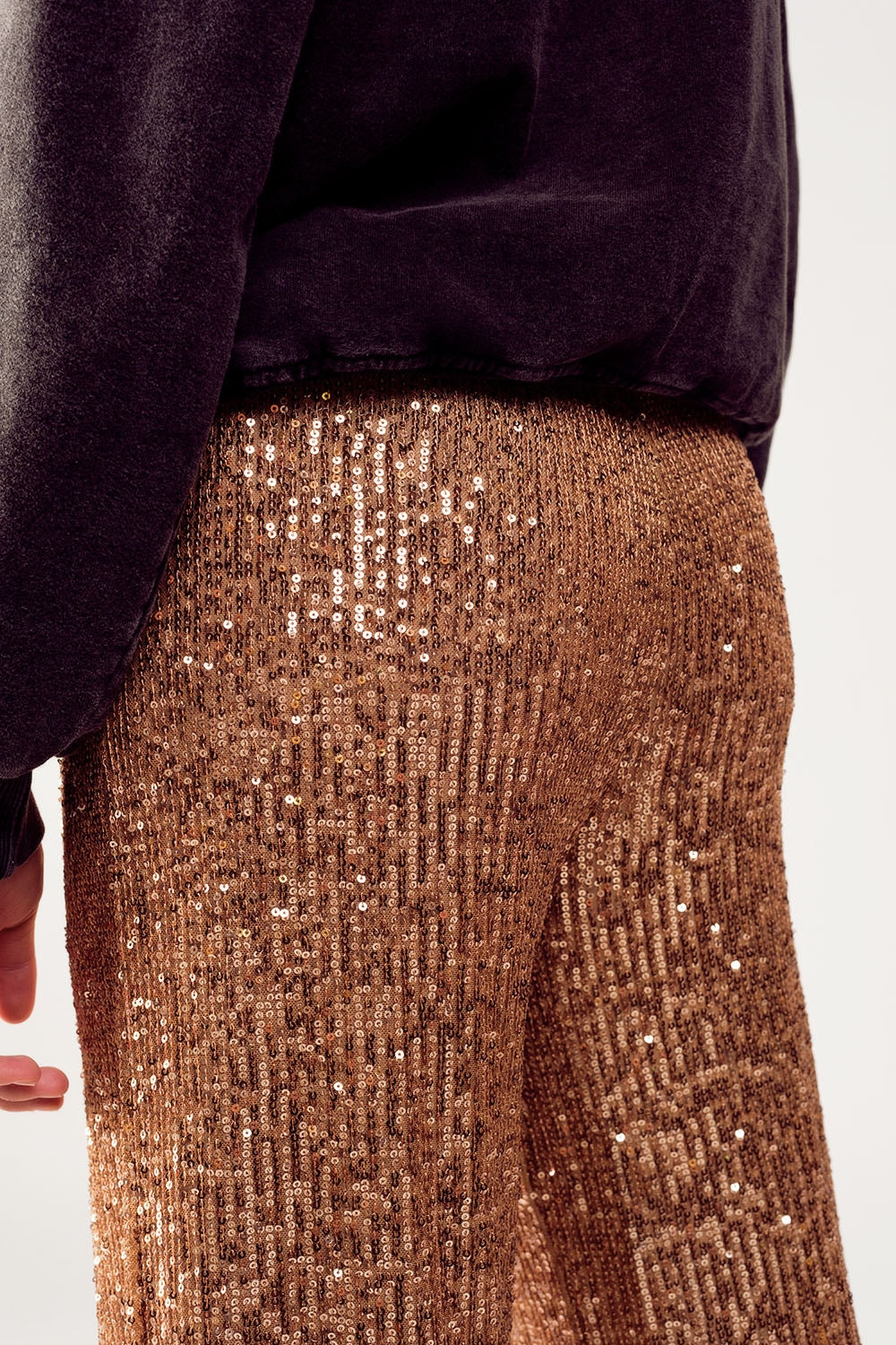 Pantaloni ampi in paillettes oro