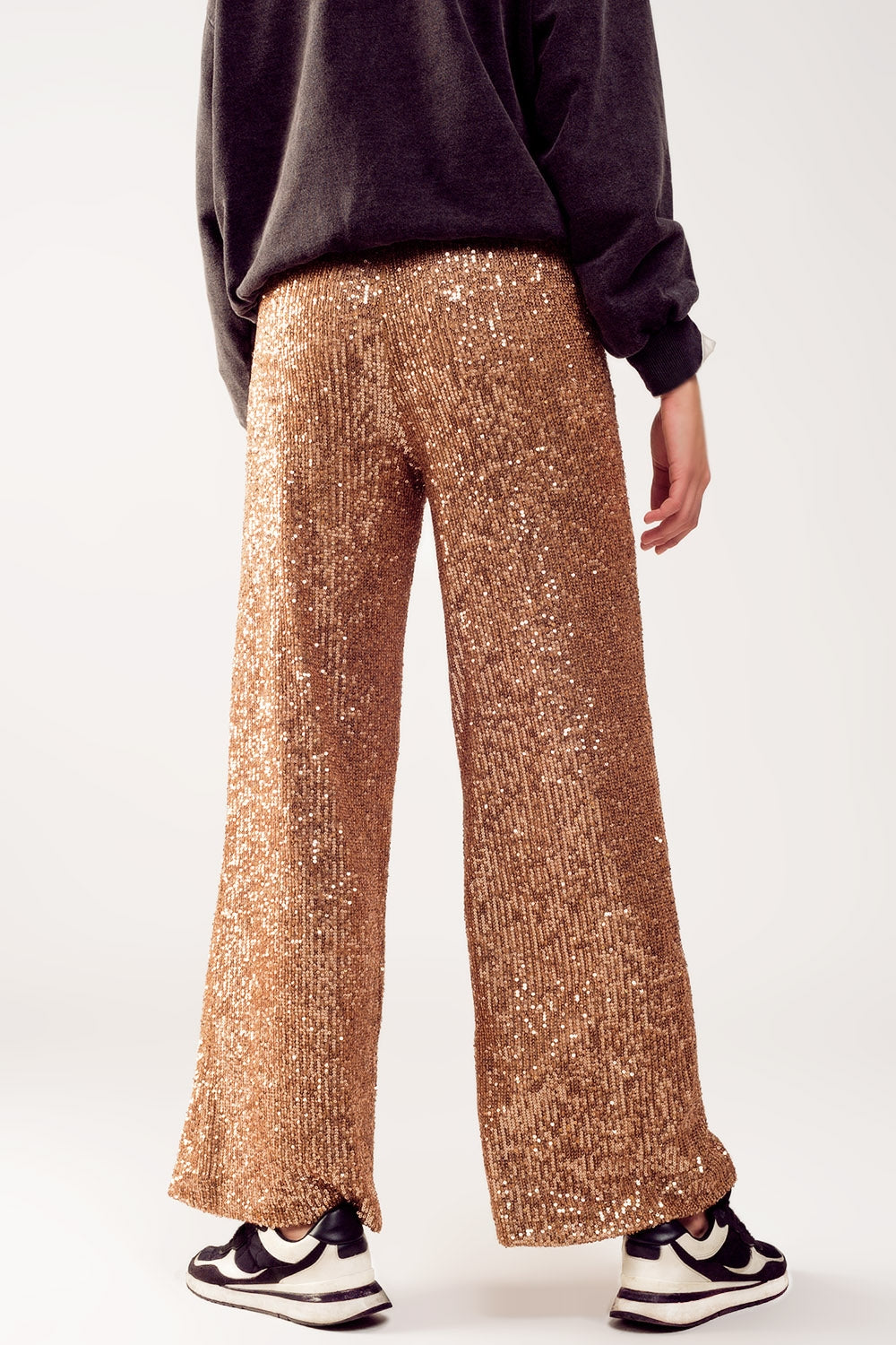 Pantaloni ampi in paillettes oro