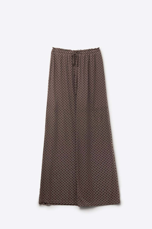 Pantaloni chic marroni a pois trasparenti con tasche laterali