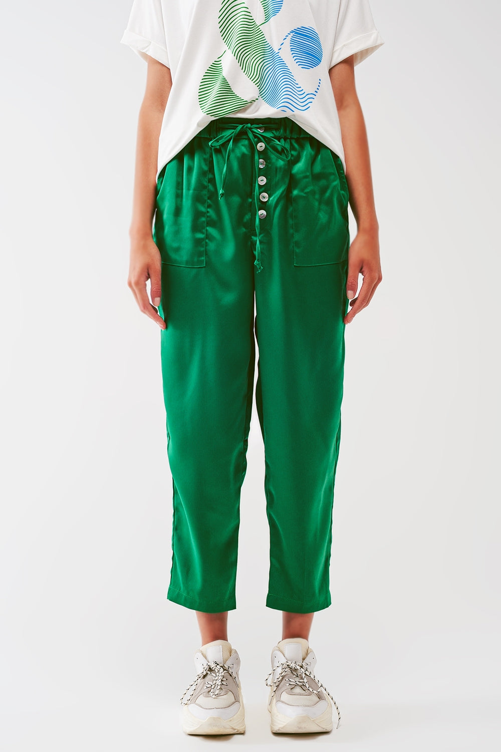 Pantaloni crop in raso verde