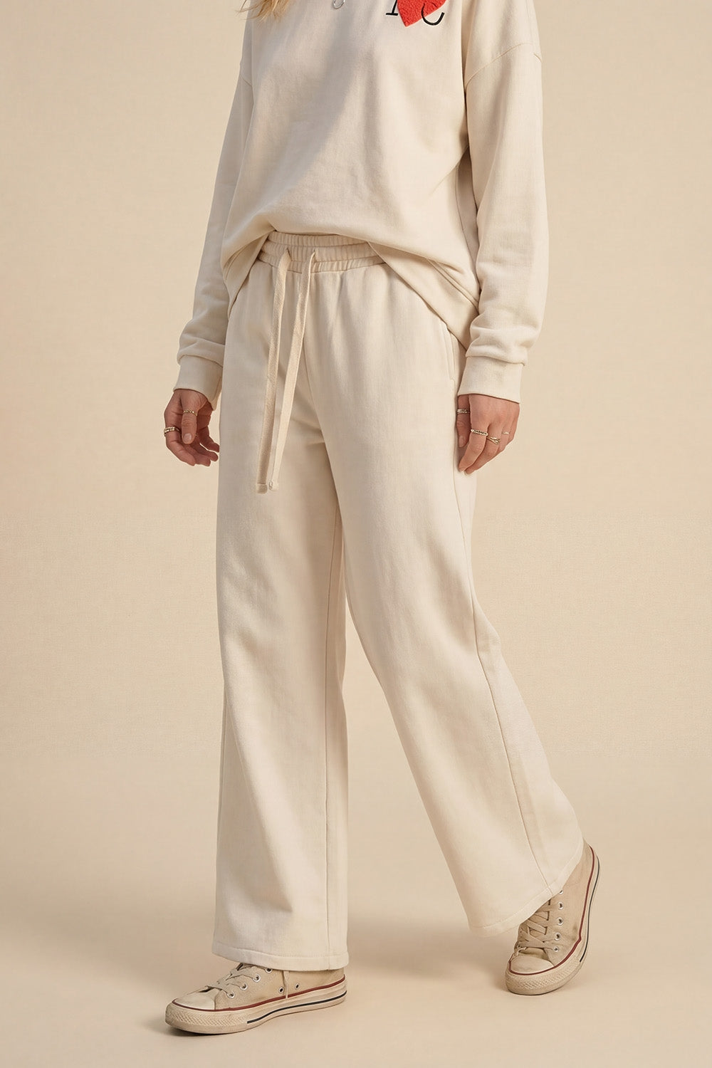Q2 Pantaloni da ginnastica dritti in maglia panna con elastico in vita e cravatta