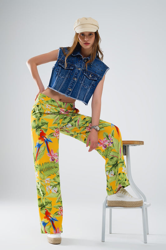 Q2 Pantaloni gialli con stampa tropicale e zip laterale