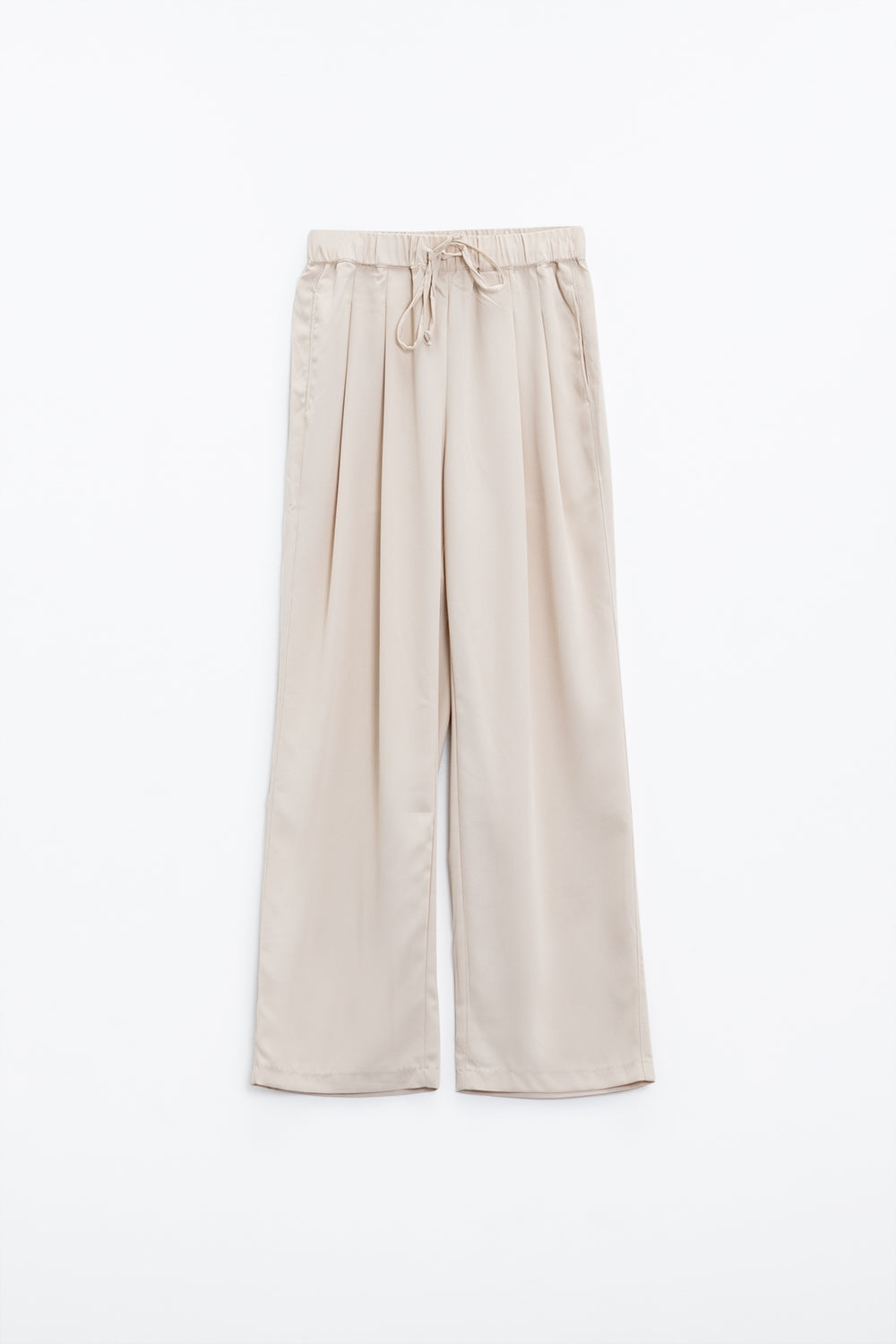 Pantaloni in beige con tasche frontali e coulisse di chiusura