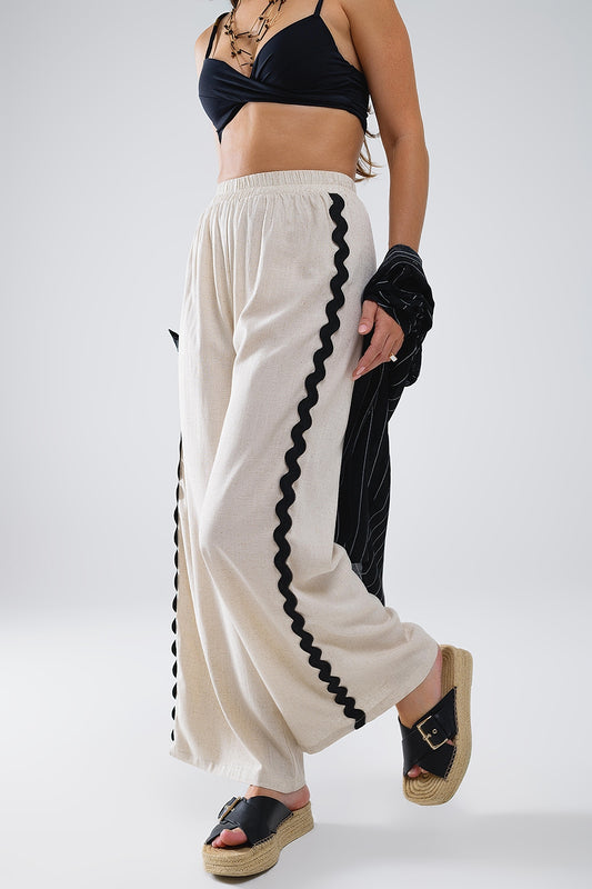 Q2 Pantaloni in lino con orlo smerlato a contrasto beige