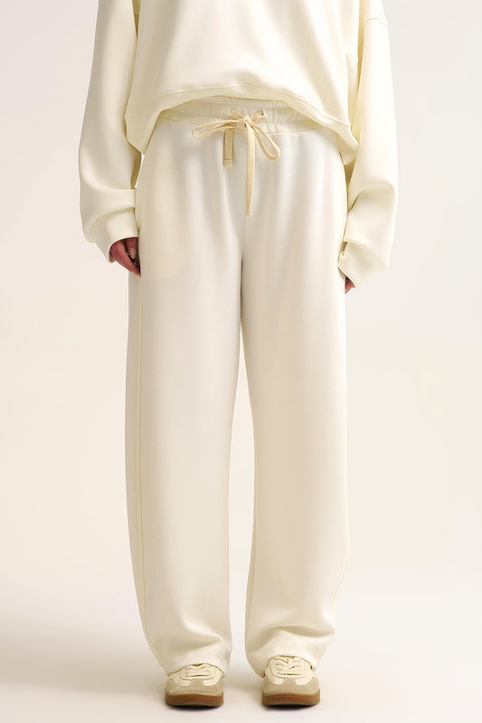 Q2 Pantaloni jogger in maglia morbidissima color crema con coulisse in vita