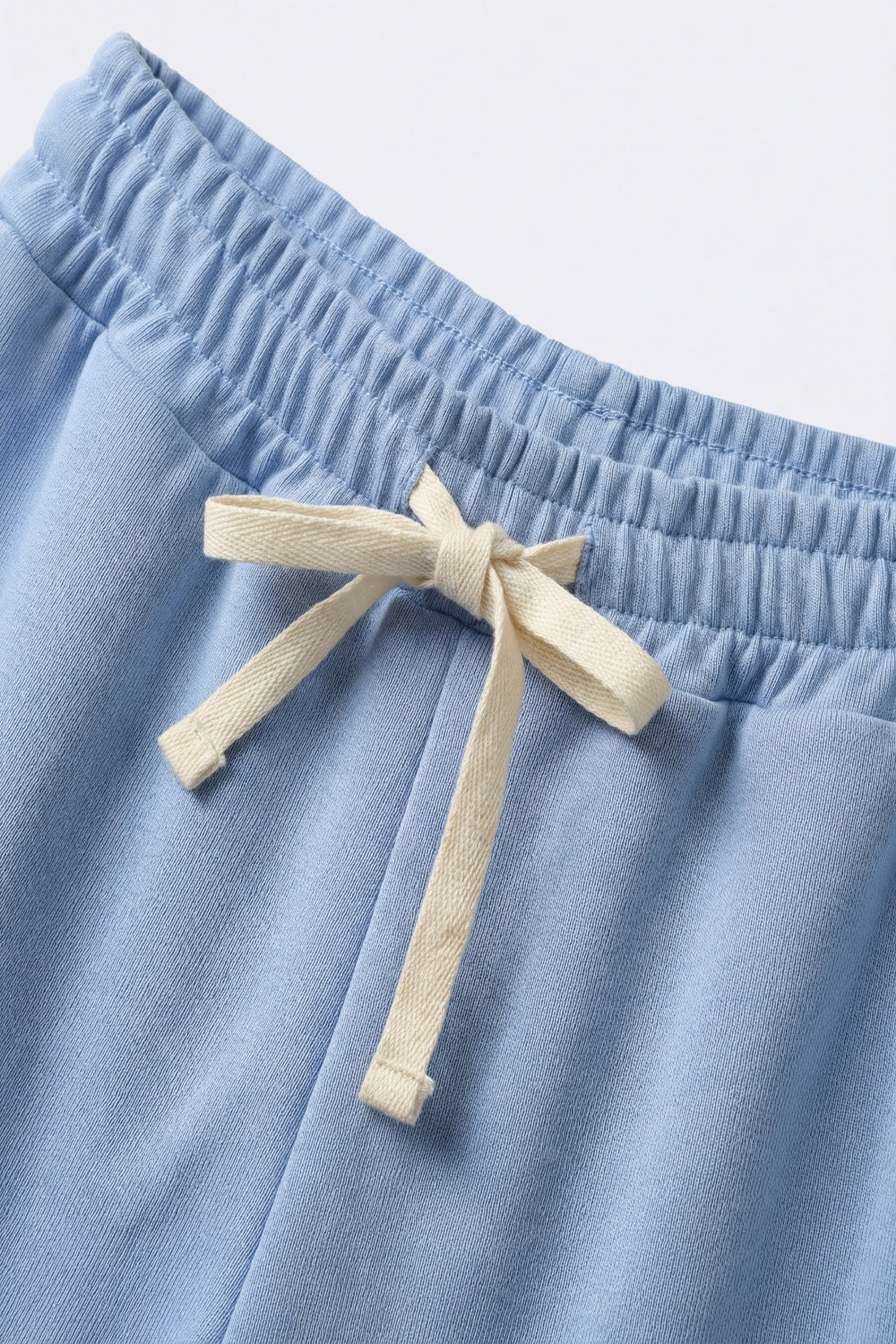 Pantaloni jogger in maglia morbidissima di colore blu con coulisse in vita