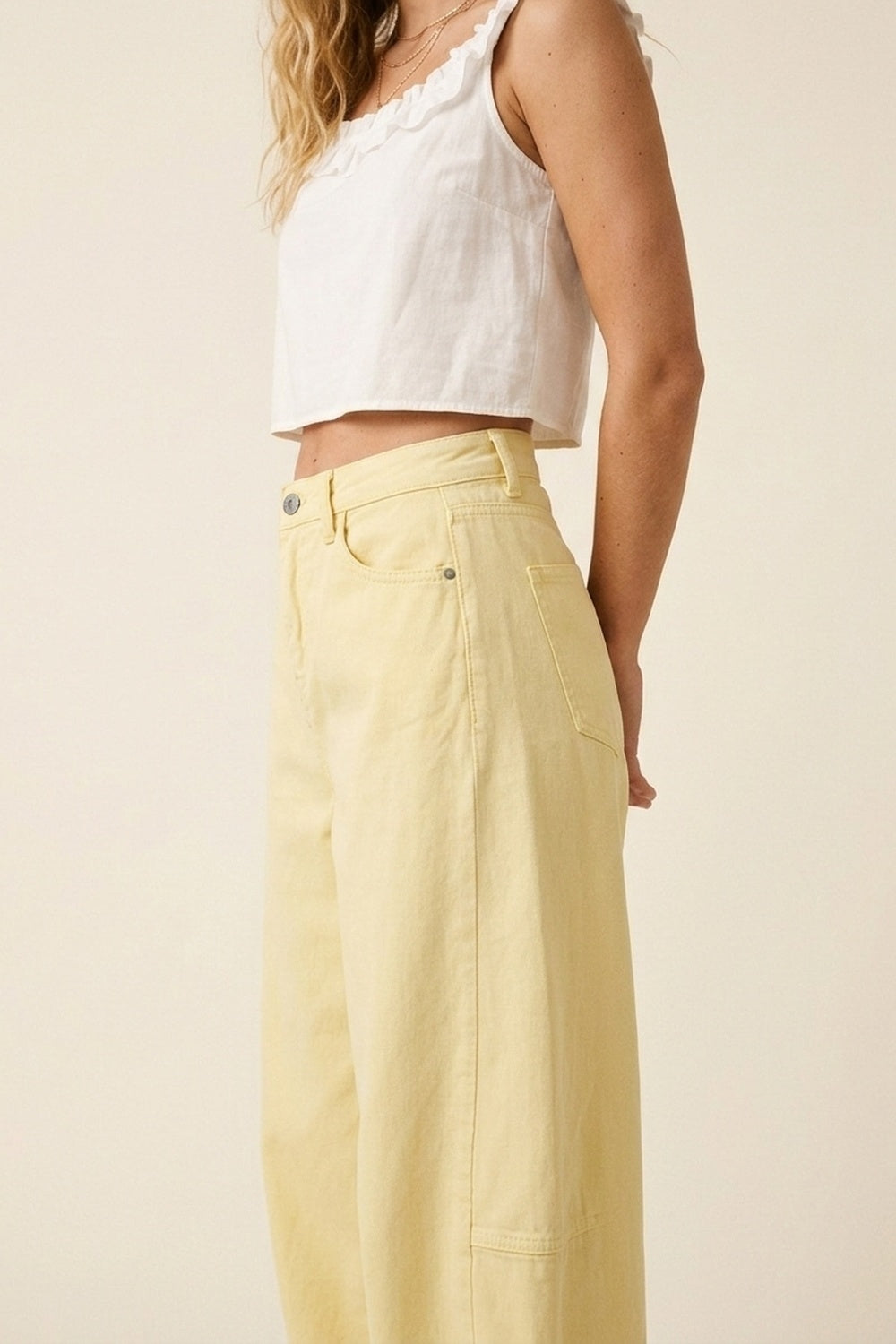 Pantaloni larghi in cotone giallo chiaro con cucitura laterale