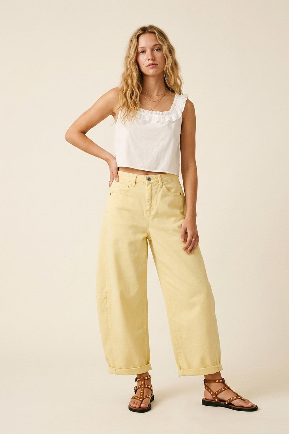Pantaloni larghi in cotone giallo chiaro con cucitura laterale