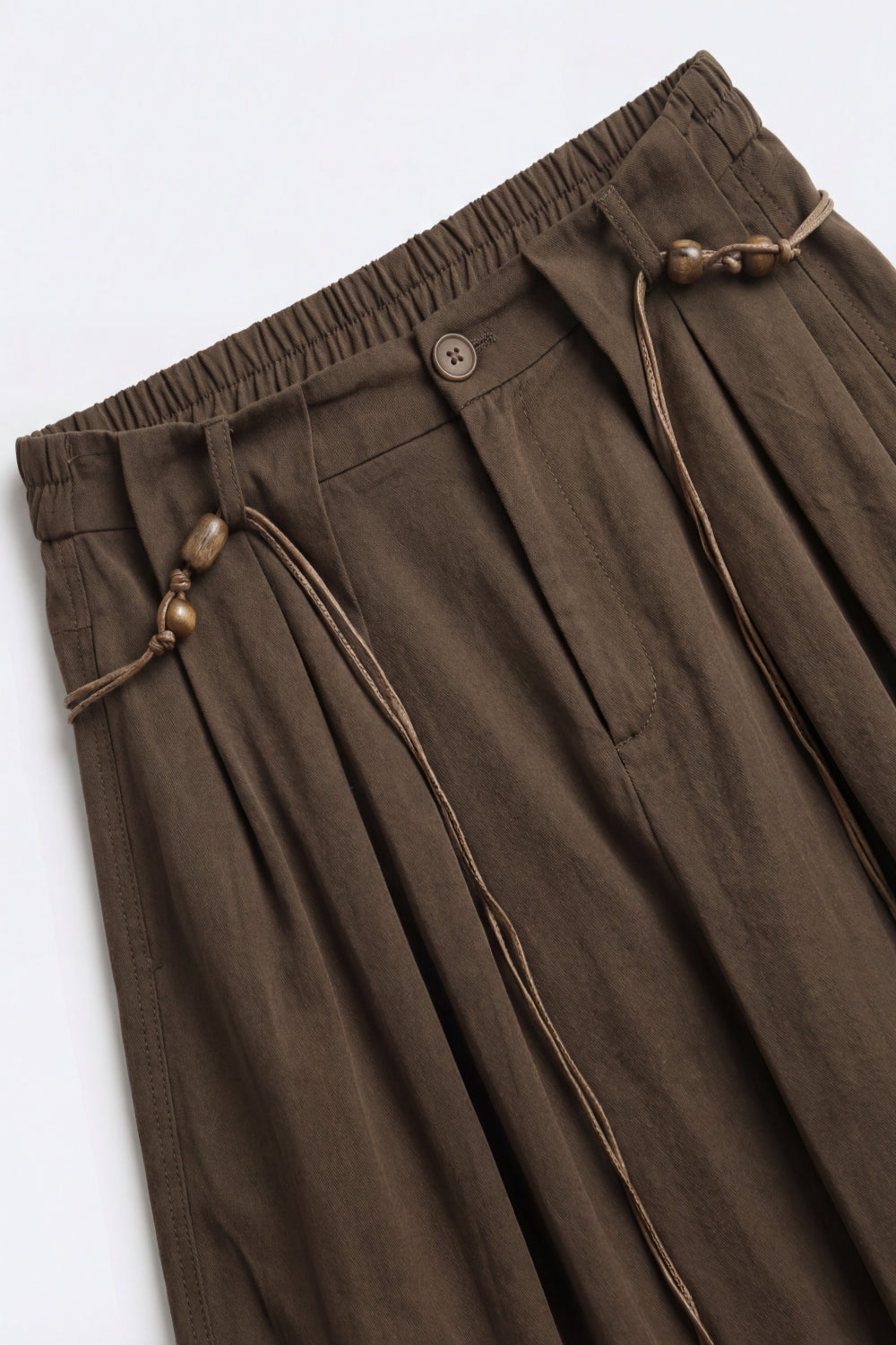Pantaloni marroni con gamba larga e coulisse dal taglio rilassato