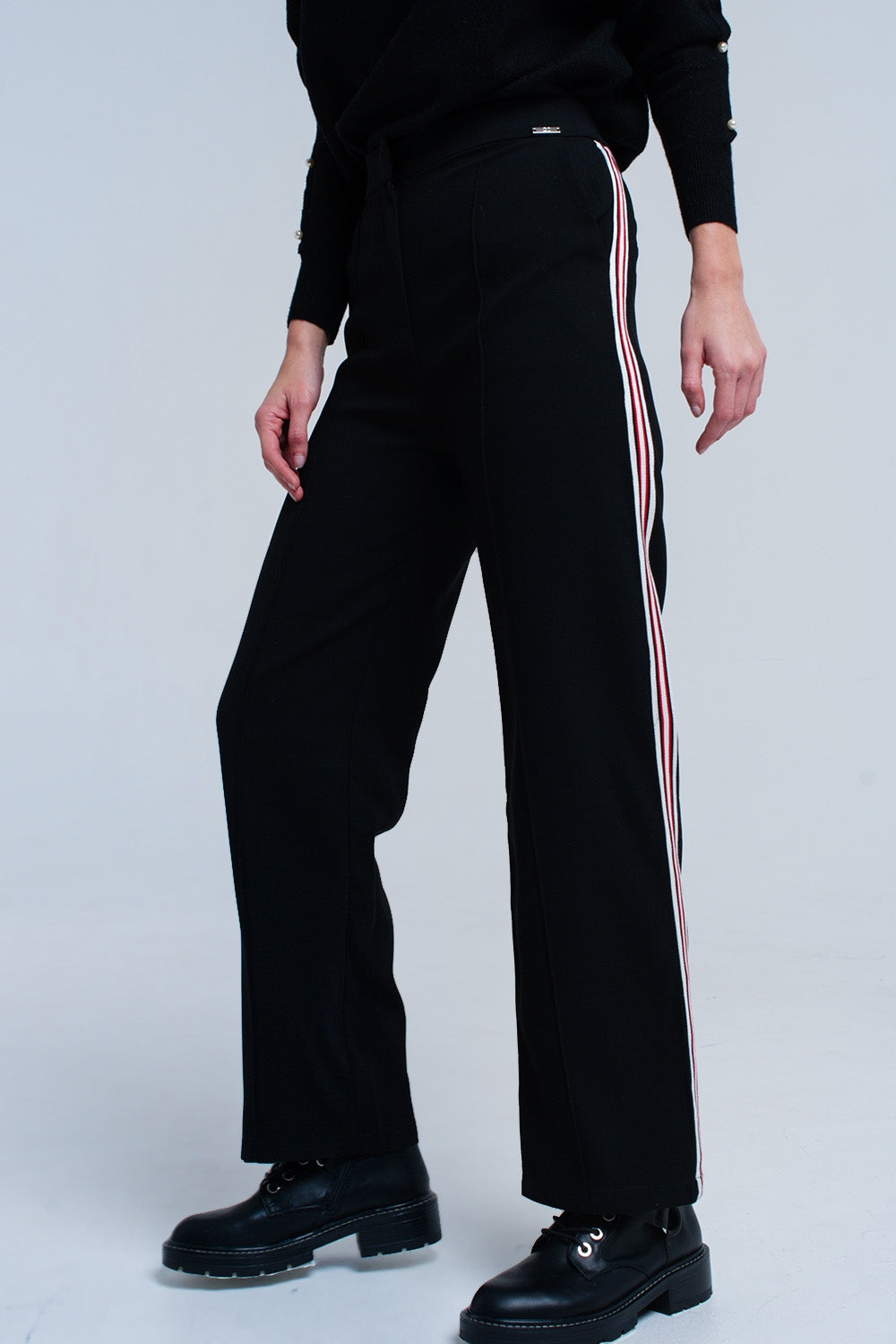 Pantaloni neri con dettaglio a righe