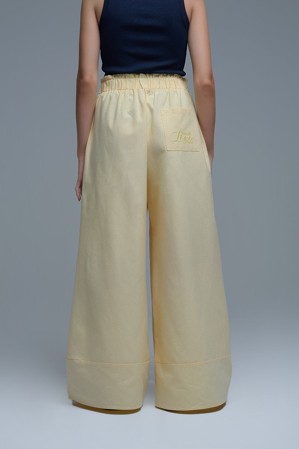 Pantaloni palazzo a righe gialle con gamba extra larga