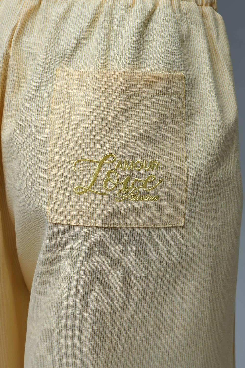 Pantaloni palazzo a righe gialle con gamba extra larga