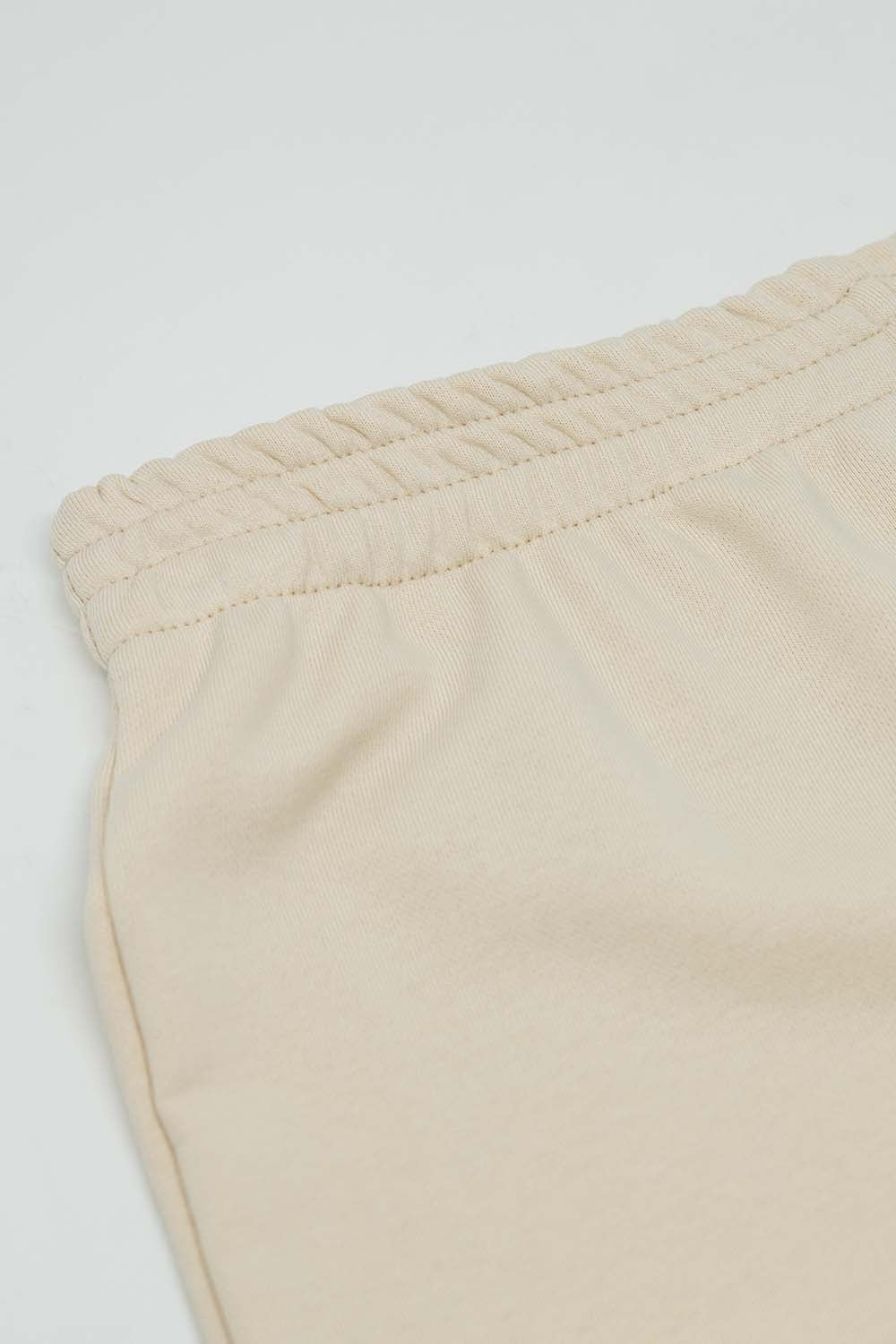 Pantaloni panna a vita alta con elastico interno e gamba larga