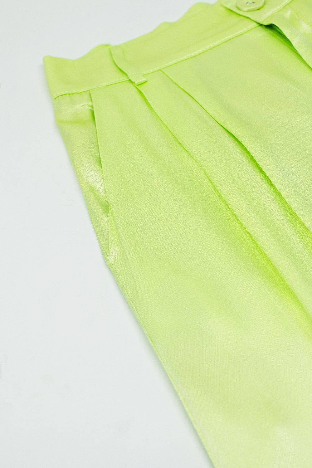 Pantaloni raso svasati con tasche in lime