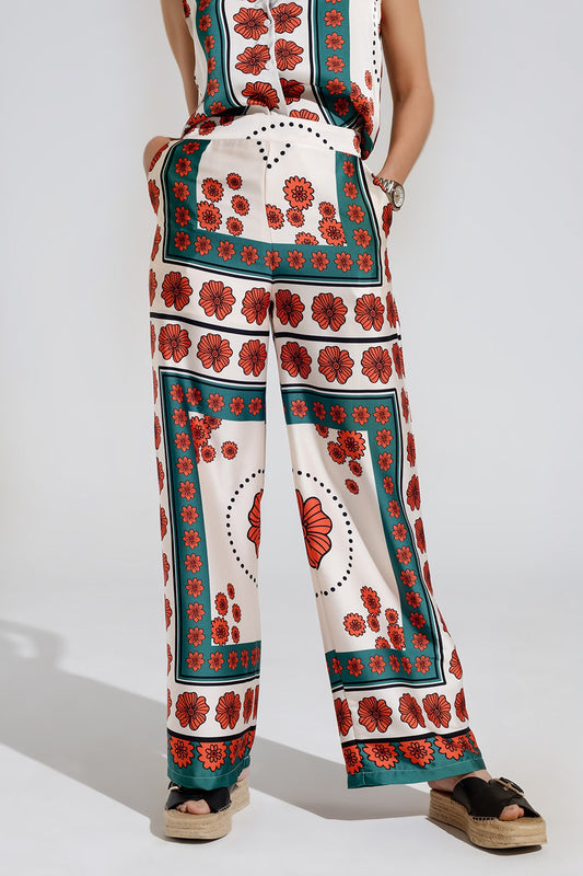 Q2 Pantaloni svasati color crema con design floreale