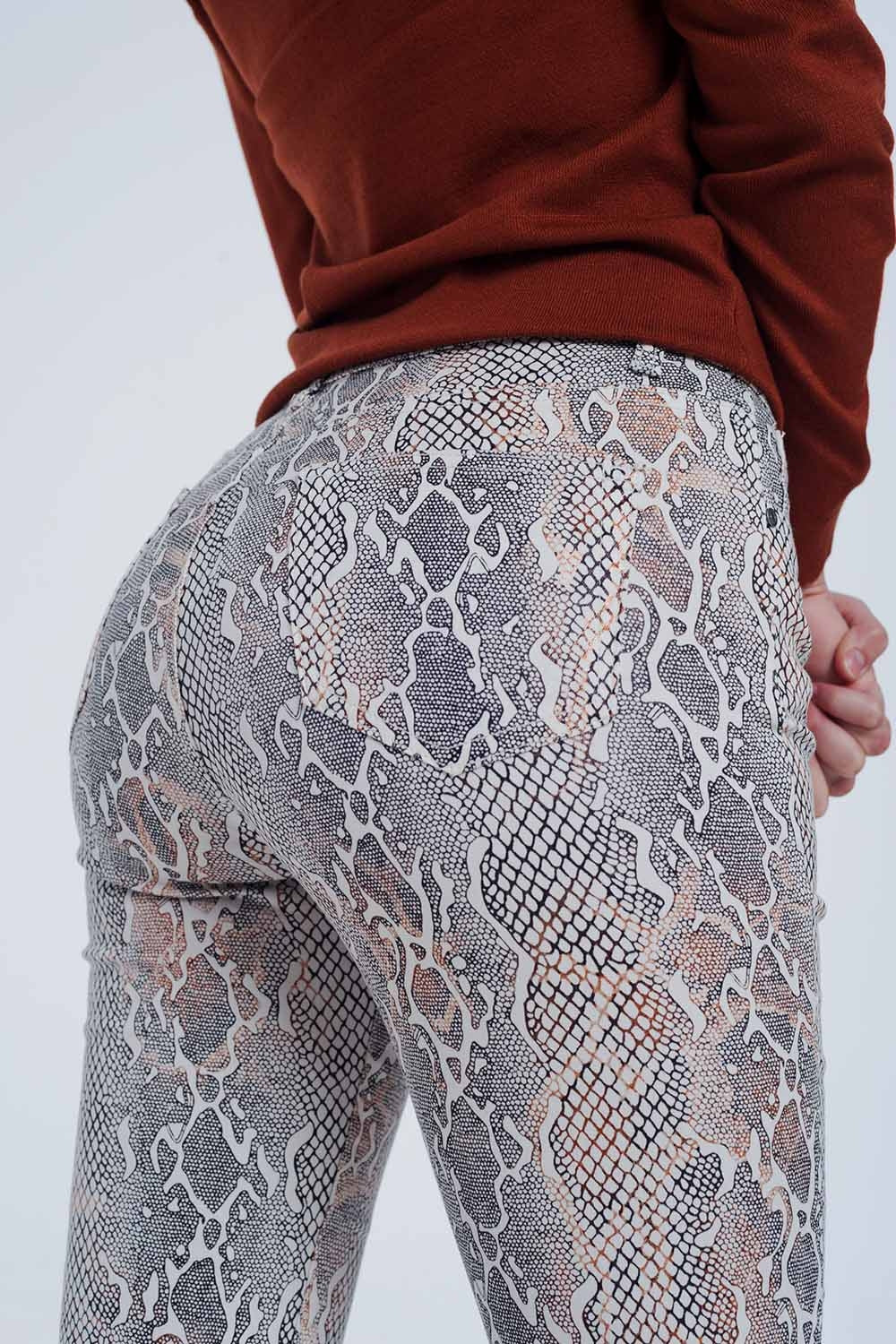 Pantaloni testurizzati pitonati beige