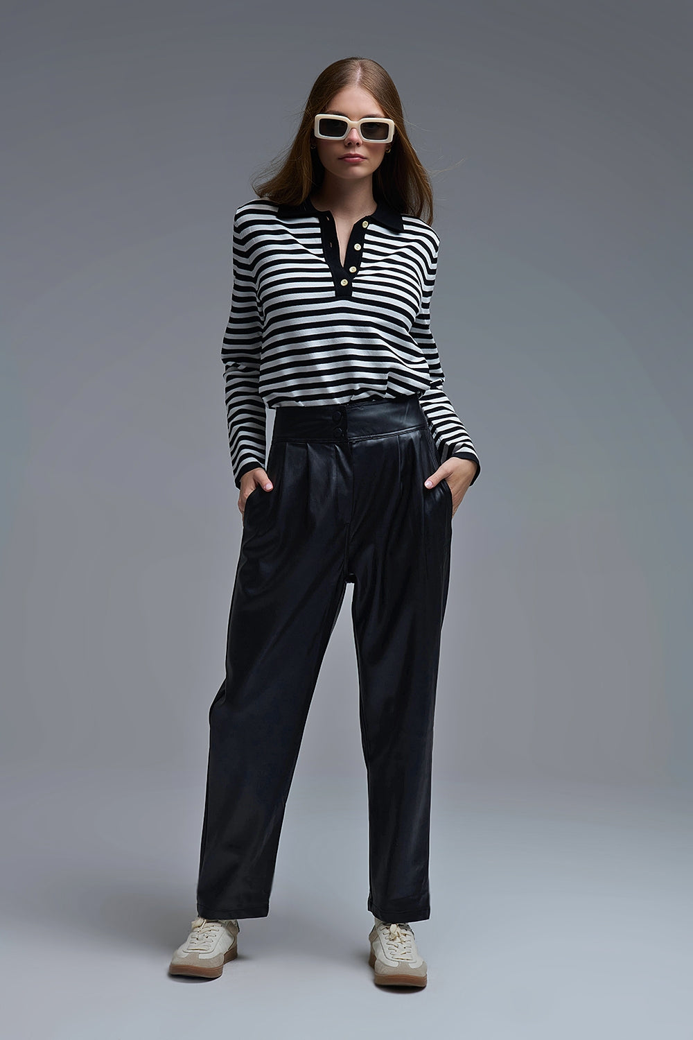 Polo a maniche lunghe a righe bianche e nere