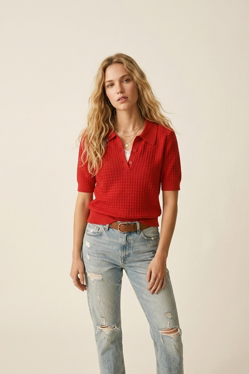Polo in maglia a nido d'ape con abbottonatura in rosso a manica corta