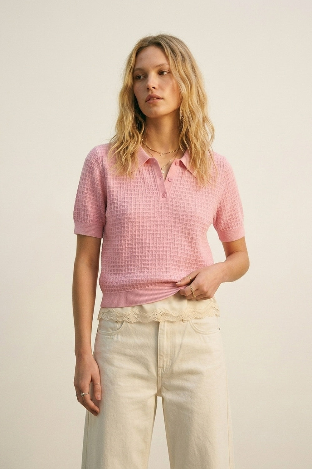 Polo in maglia a nido d'ape con bottoni in rosa con manica corta