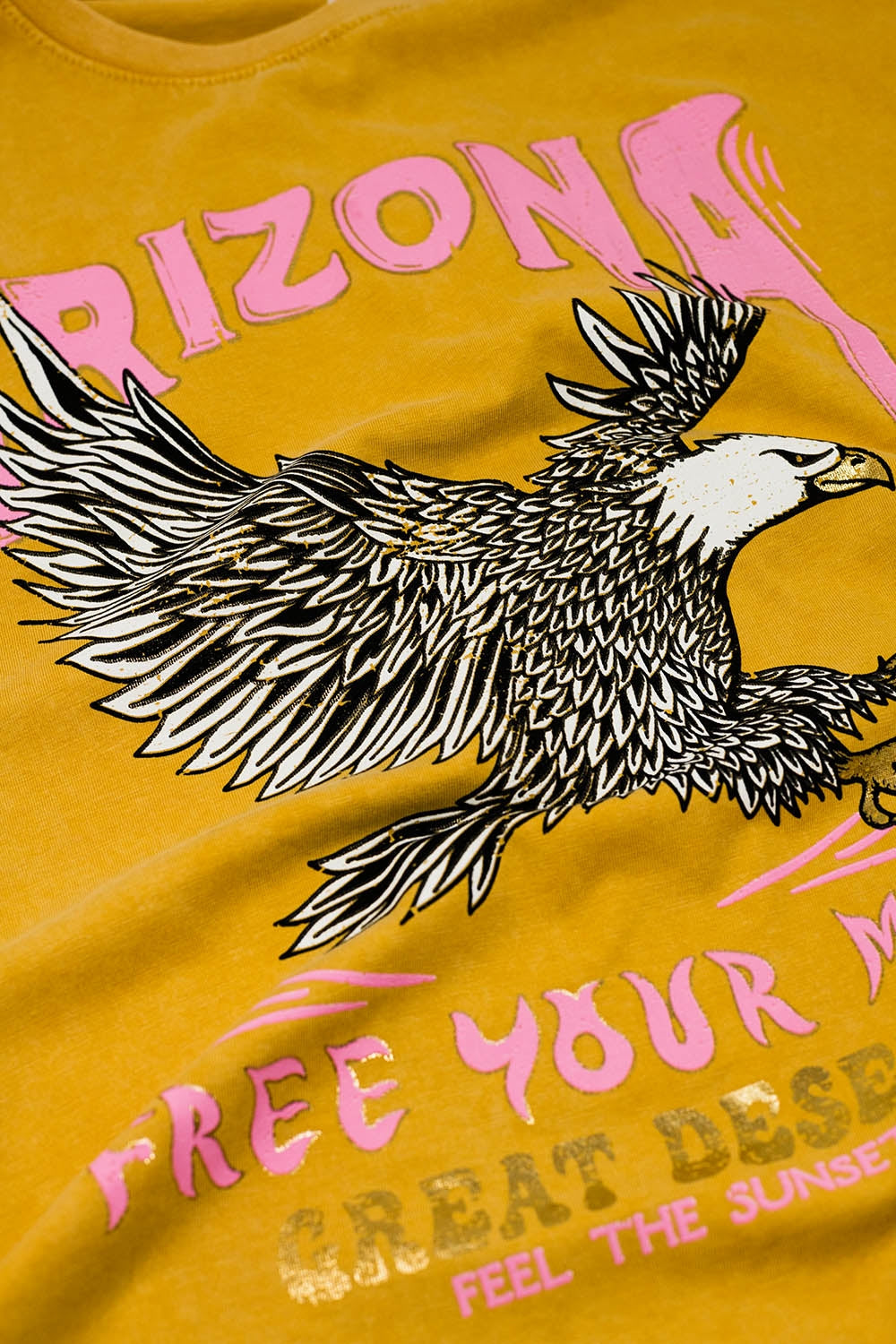 T-shirt Arizona con stampa digitale dell'aquila in arancione