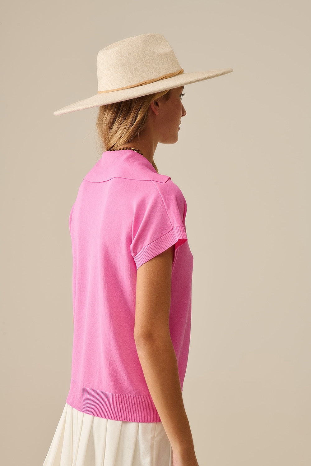 Top a manica corta in maglia fine tipo Polo in fucsia