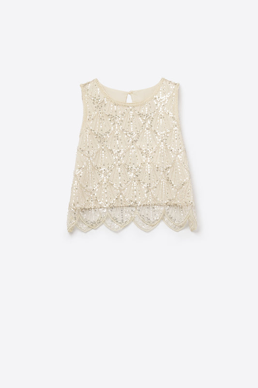 Top chic corto con paillettes in panna