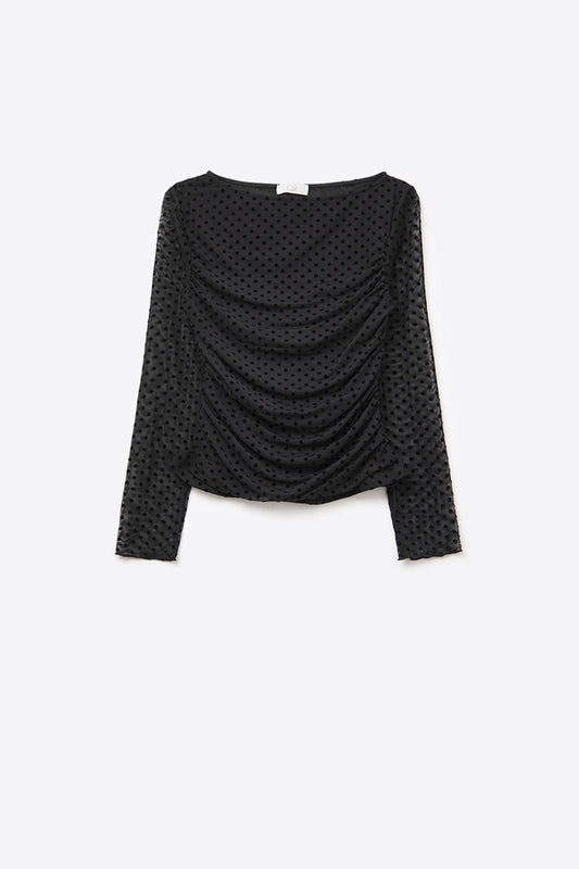 Top chic nero a pois trasparenti