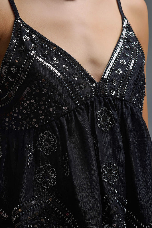 Top con camisole in paillettes in nero con dettaglio floreale impreziosito
