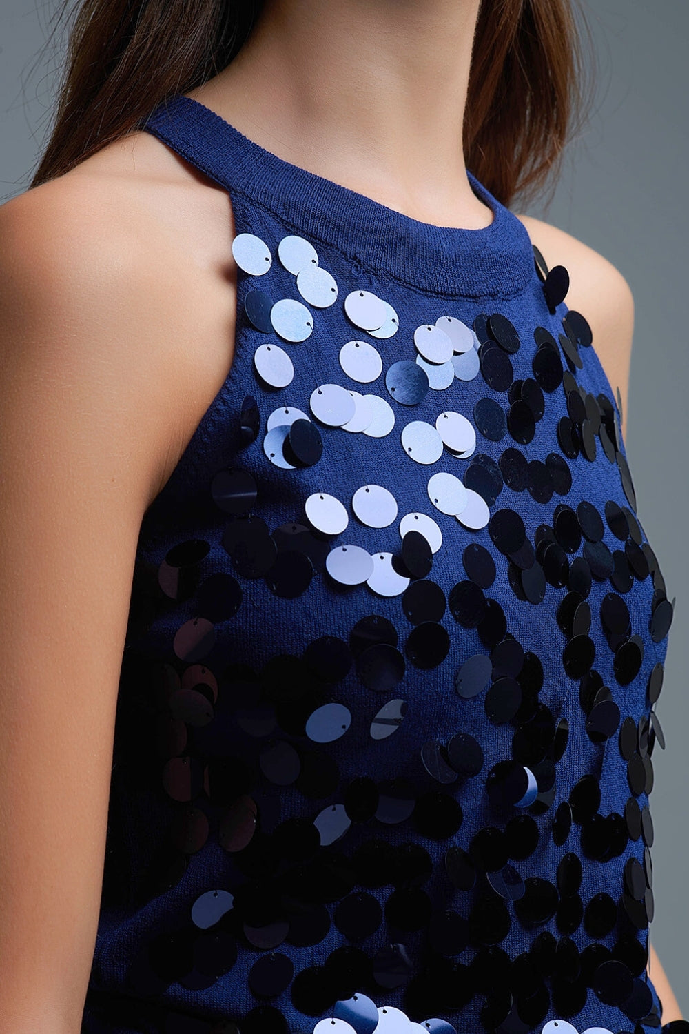 Top in maglia blu navy con dettagli in paillettes