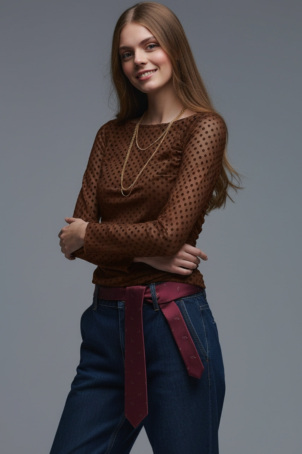 Top marrone a pois in tessuto elasticizzato trasparente