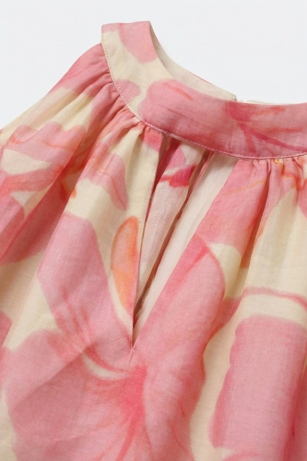 Top rosa in chiffon morbido e floreale