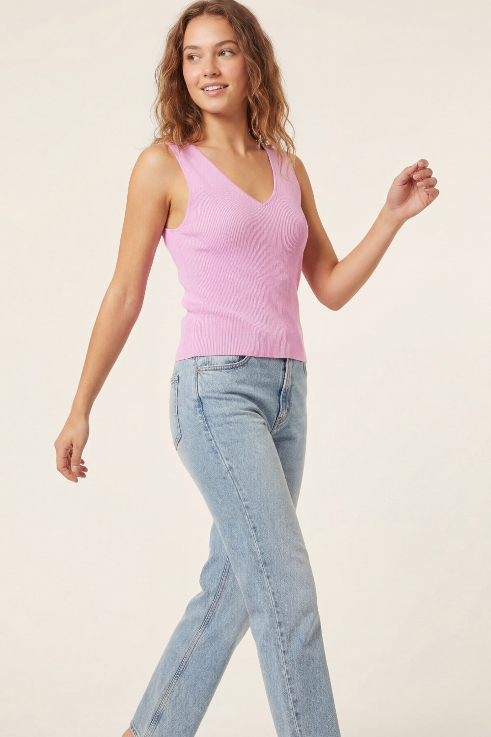 top rosa senza maniche in maglia fine con scollo a V