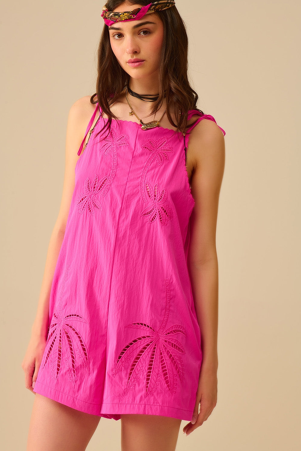 Tuta con palma ricamata rosa