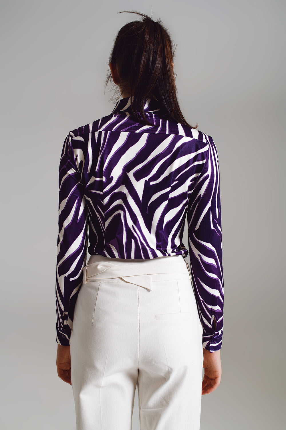 Blusa con stampa zebra in viola e crema
