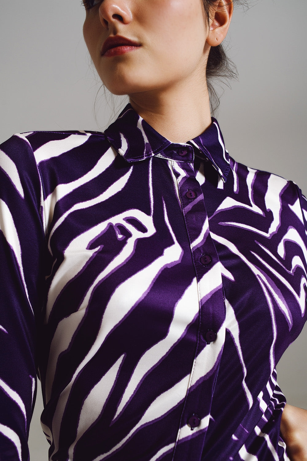 Blusa con stampa zebra in viola e crema